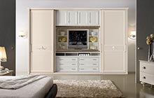 Sliding door mod. RIGOLETTO with carvings and smoothly square frame with a dove-color lacquer finish and a white frame. Central module: drawers/bookshelf with a square silver frame
