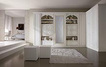 Door mod. NETTUNO doors and sliding doors - Glazed antique white finish.Closet with modules equipped for HIM/HER. 