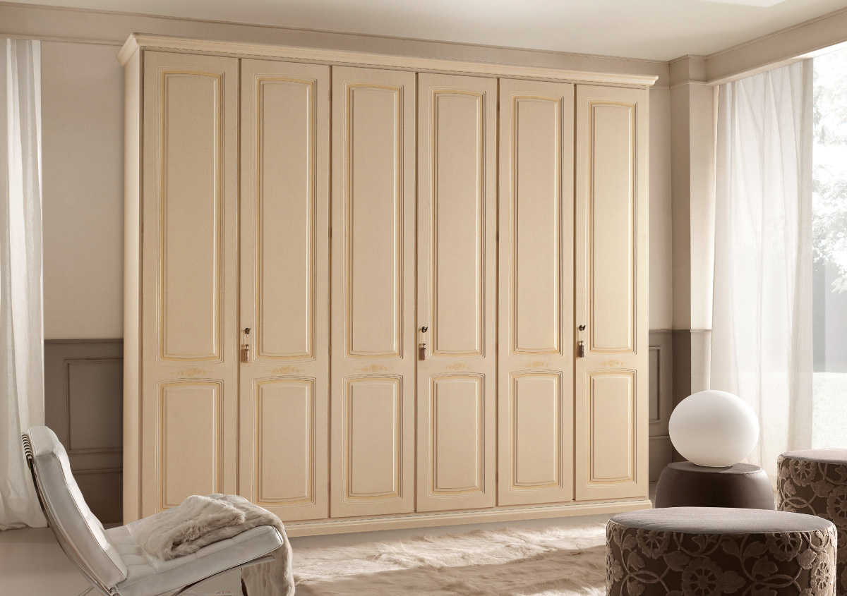 Wardrobe with 6 hinged doors,  glazed magnolia finish, ochre colour wash and decorations