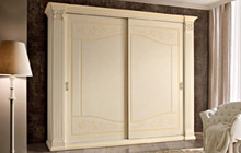 Wardrobe with 2 sliding doors, glazed honey finish with ochre decorations and colour wash